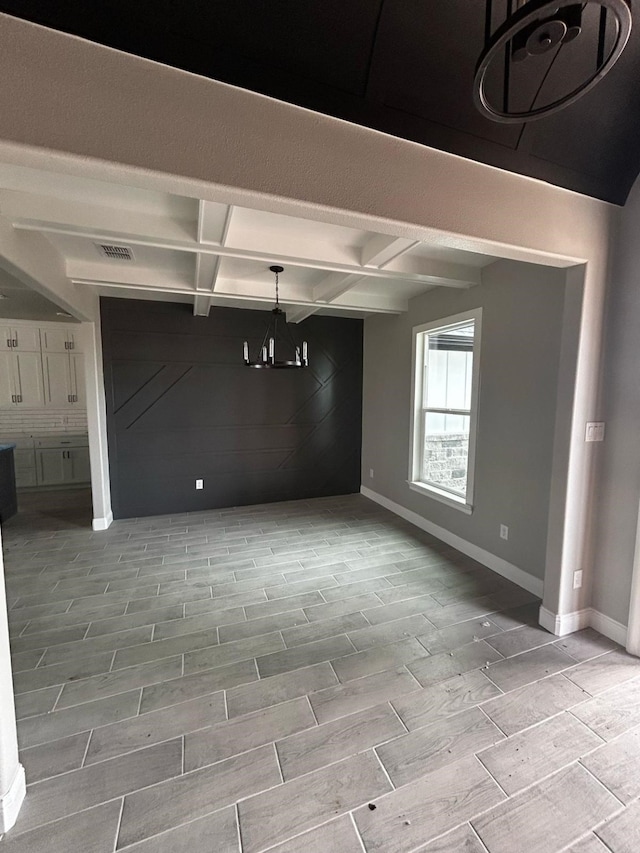 interior space featuring visible vents and baseboards