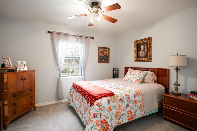 bedroom featuring a ceiling fan, baseboards, and carpet floors