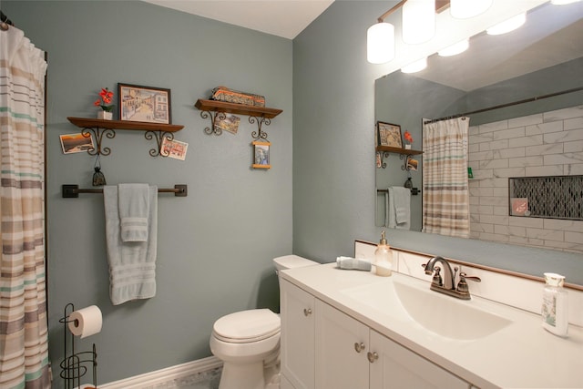 bathroom with a shower with shower curtain, toilet, and vanity