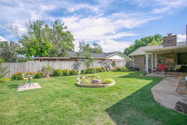 view of yard featuring a fenced backyard and a patio