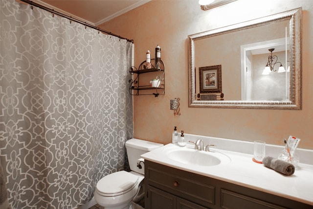 bathroom with curtained shower, toilet, vanity, and crown molding