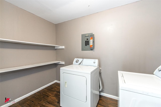 laundry room with laundry area, electric panel, separate washer and dryer, and wood finished floors