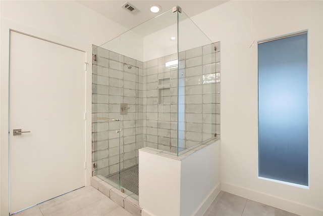 full bath featuring baseboards, visible vents, recessed lighting, a shower stall, and tile patterned floors