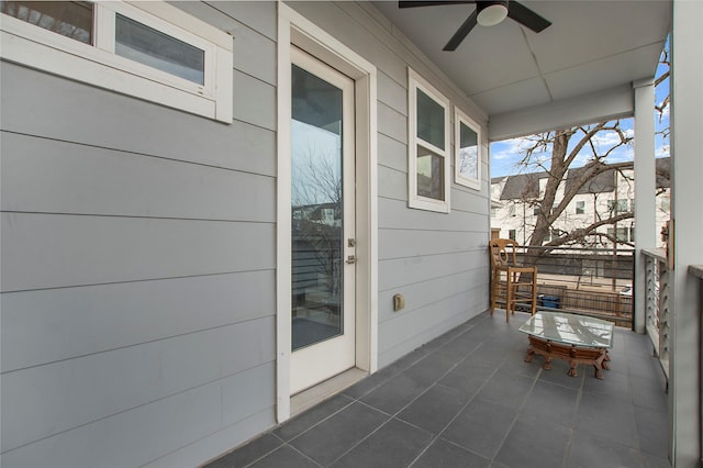 view of patio / terrace featuring a balcony and a ceiling fan