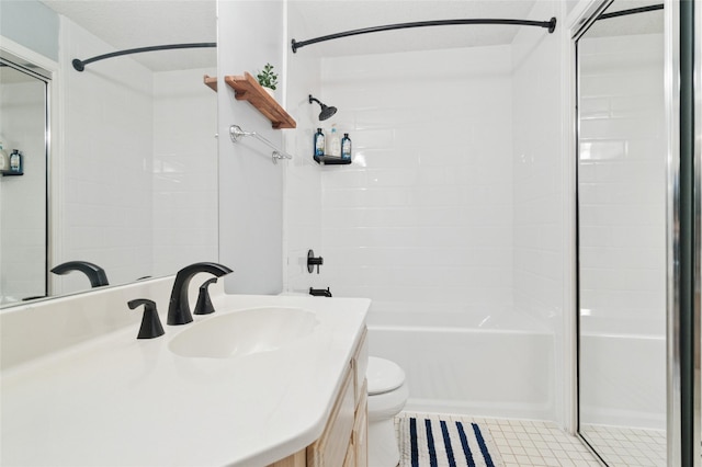 full bathroom featuring tile patterned flooring, toilet, vanity, and bathtub / shower combination