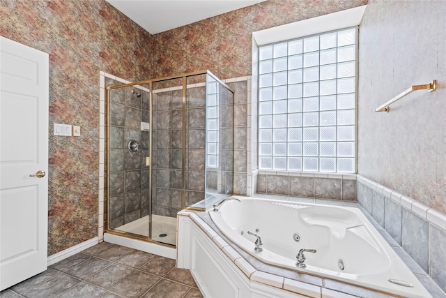 bathroom with tile patterned floors, a whirlpool tub, a shower stall, and wallpapered walls