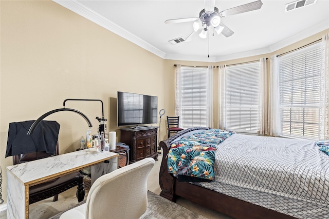 bedroom featuring ceiling fan, visible vents, and ornamental molding