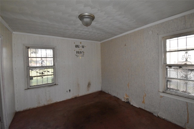 unfurnished room with ornamental molding