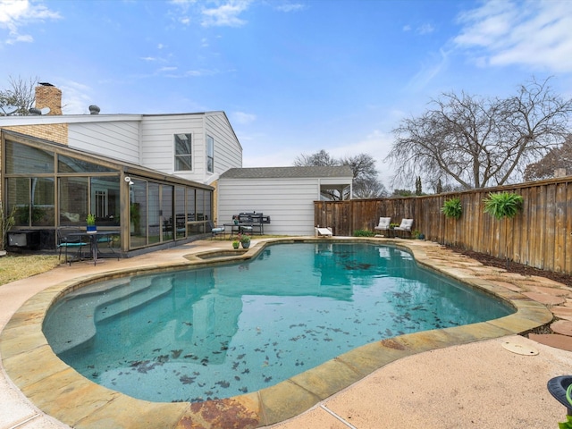 view of swimming pool with a patio, a fenced backyard, and a fenced in pool