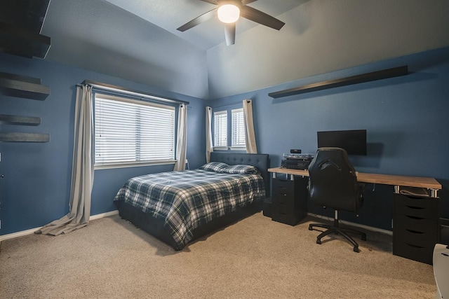 carpeted bedroom featuring lofted ceiling, a ceiling fan, and baseboards