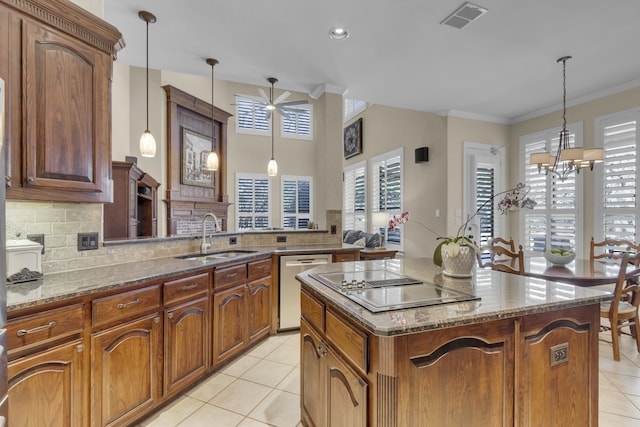 kitchen featuring visible vents, a sink, a notable chandelier, black electric cooktop, and stainless steel dishwasher