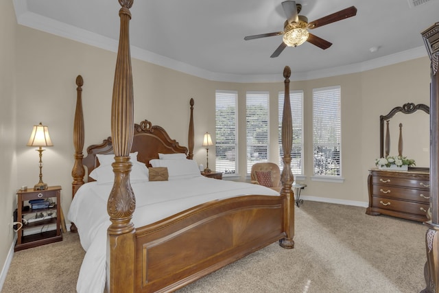 bedroom featuring visible vents, light carpet, and ornamental molding