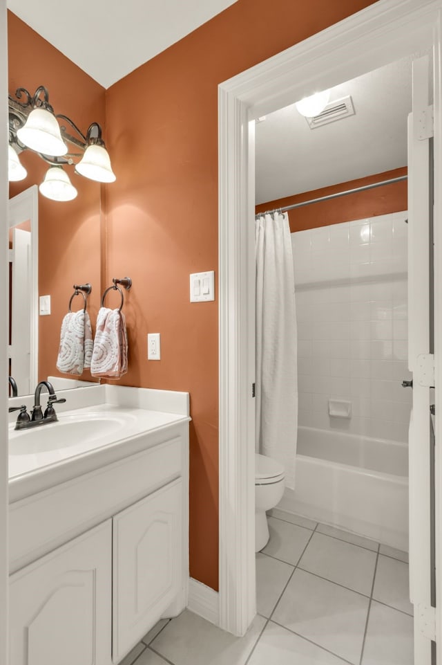 full bathroom with tile patterned floors, visible vents, toilet, shower / bath combo, and vanity