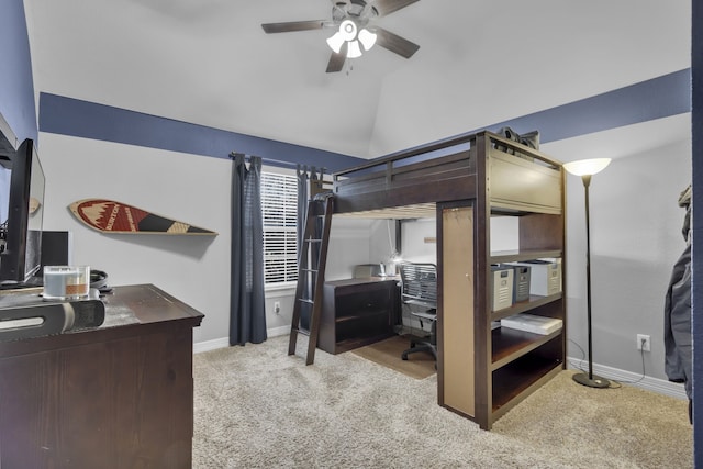 carpeted bedroom featuring baseboards, lofted ceiling, and a ceiling fan