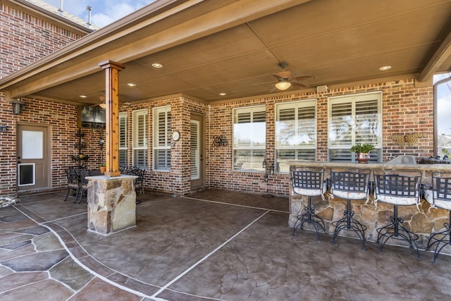 view of patio / terrace featuring a ceiling fan