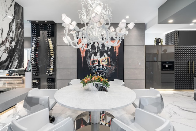 dining room with recessed lighting, marble finish floor, and a chandelier