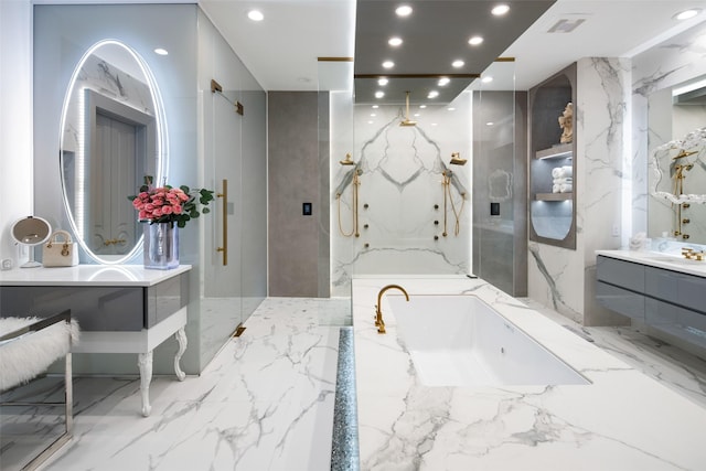 bathroom featuring a marble finish shower, recessed lighting, marble finish floor, and stone wall