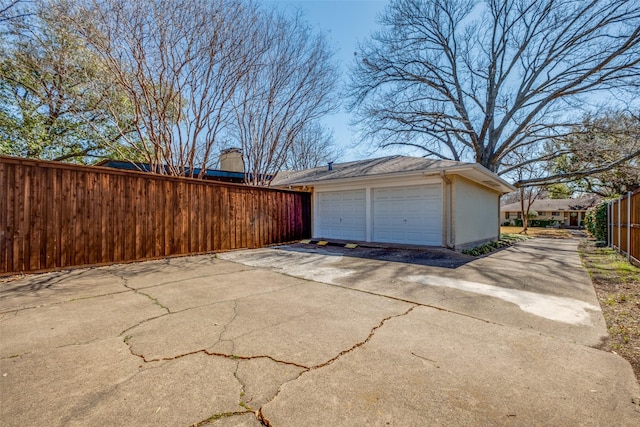 detached garage with fence