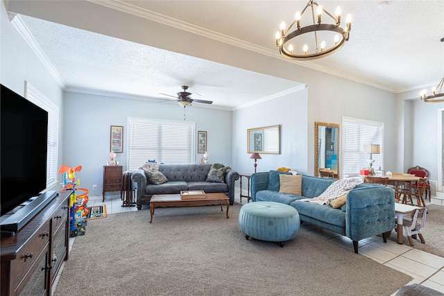 carpeted living room featuring a wealth of natural light, a textured ceiling, and crown molding