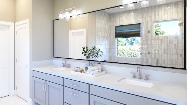 bathroom featuring double vanity and a sink