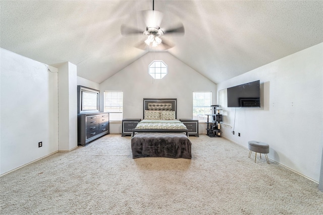 bedroom featuring light carpet, a textured ceiling, lofted ceiling, and ceiling fan