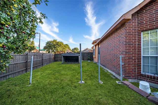 view of yard featuring a fenced backyard