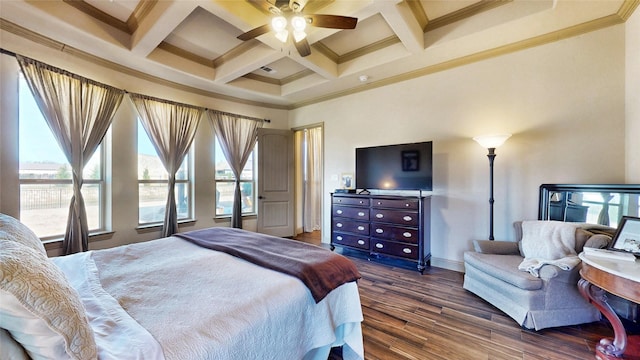 bedroom featuring dark wood finished floors, beam ceiling, crown molding, and coffered ceiling