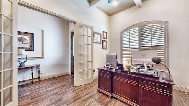 office area featuring beamed ceiling, ornamental molding, wood finished floors, french doors, and baseboards