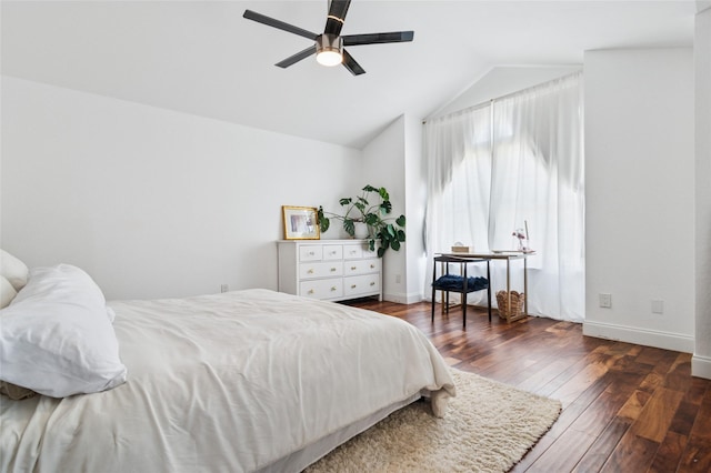 bedroom featuring ceiling fan, baseboards, lofted ceiling, and wood-type flooring