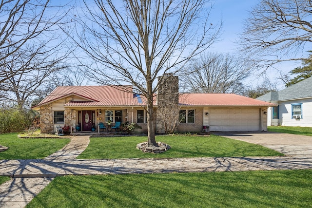 ranch-style home with a front yard, driveway, an attached garage, covered porch, and stone siding