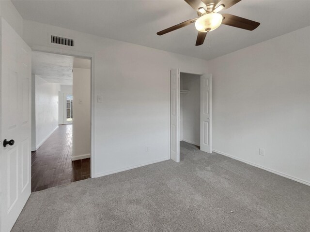 full bath with tile patterned flooring, shower / bathtub combination, toilet, and vanity