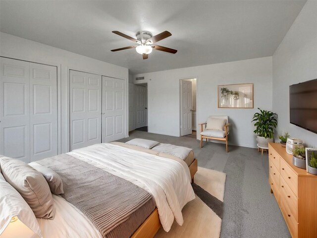 carpeted bedroom with a ceiling fan