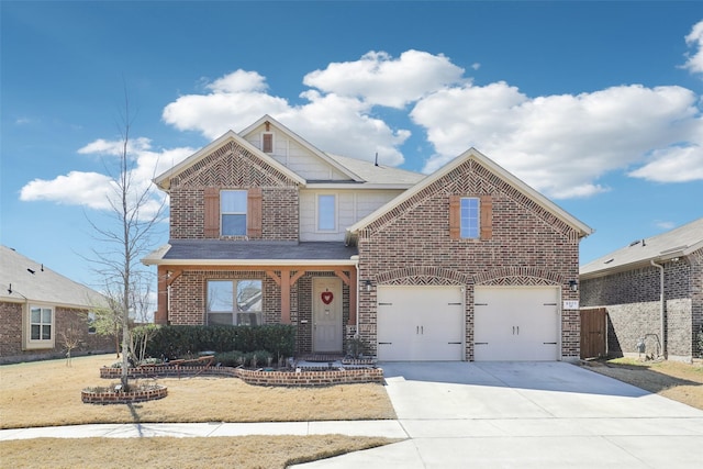 traditional home featuring an attached garage, brick siding, and driveway