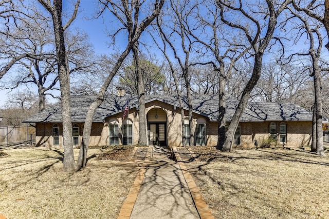 view of front of property featuring brick siding