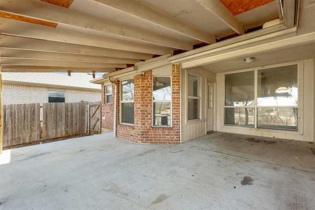 view of patio / terrace featuring fence