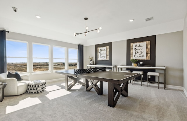 recreation room with visible vents, baseboards, carpet, and a chandelier