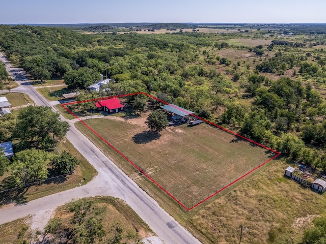 aerial view with a forest view and a rural view