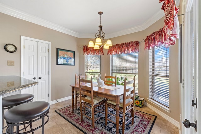 dining room featuring a chandelier, crown molding, baseboards, and light tile patterned flooring