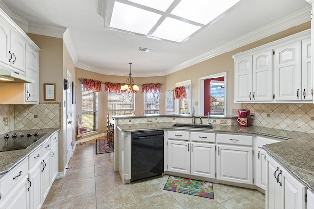 kitchen with black appliances, a sink, a peninsula, white cabinets, and light stone countertops