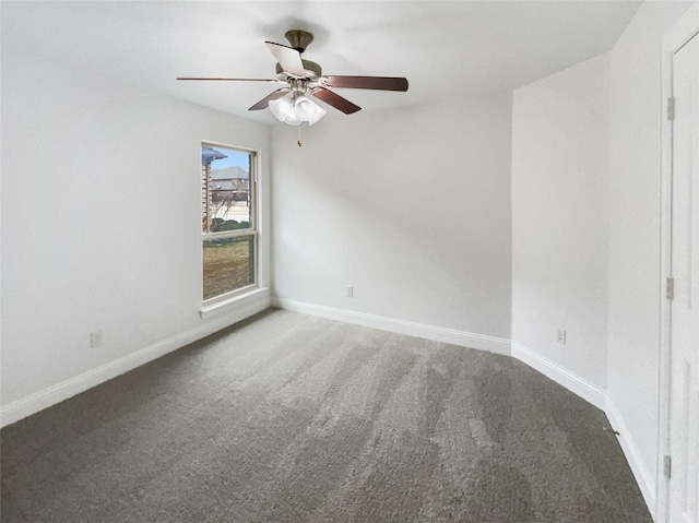 unfurnished room with baseboards, carpet floors, and a ceiling fan