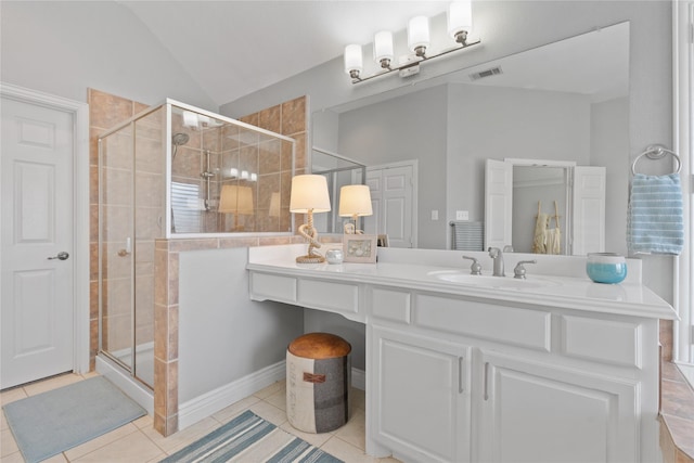 full bathroom featuring visible vents, lofted ceiling, a stall shower, tile patterned floors, and vanity