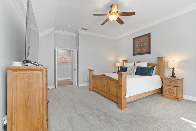 bedroom with visible vents, crown molding, baseboards, ceiling fan, and light colored carpet