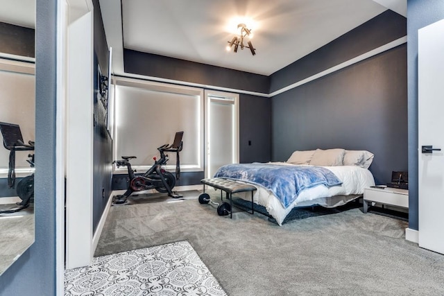 carpeted bedroom featuring baseboards