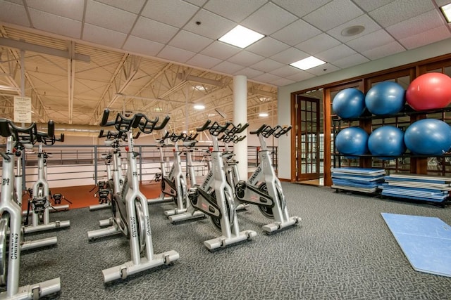 workout area with a drop ceiling