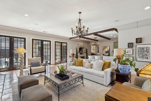 living area featuring visible vents, recessed lighting, french doors, and an inviting chandelier