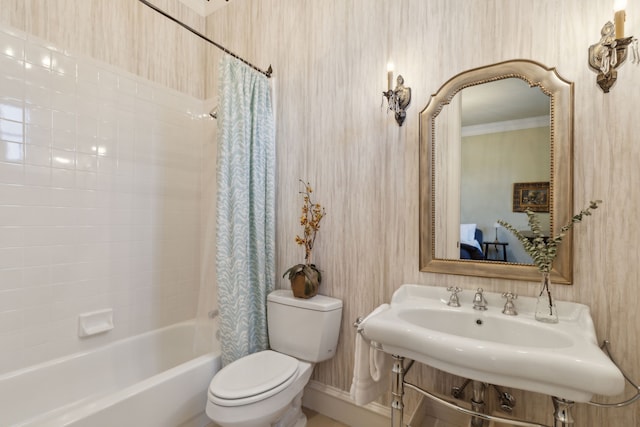 full bathroom featuring wallpapered walls, toilet, and shower / bathtub combination with curtain