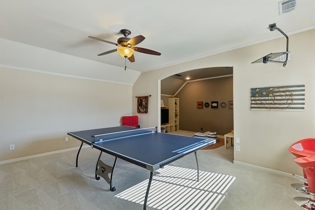 rec room featuring visible vents, carpet floors, crown molding, and vaulted ceiling