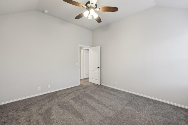 unfurnished room featuring baseboards, a ceiling fan, carpet, and vaulted ceiling