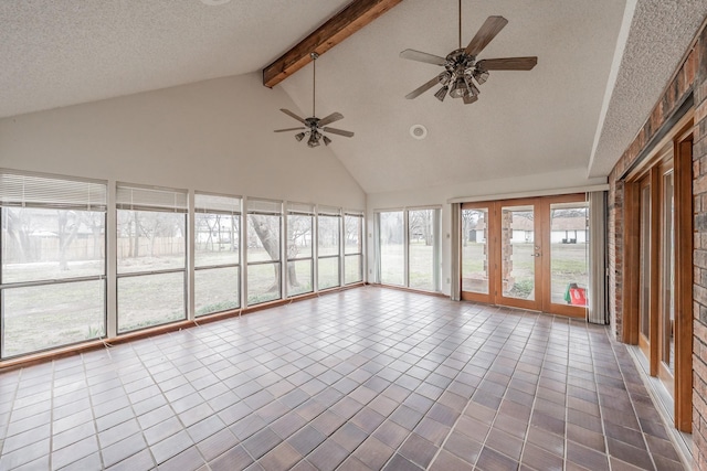 unfurnished sunroom with vaulted ceiling with beams and ceiling fan