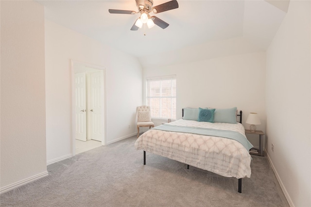 bedroom featuring baseboards, carpet, a ceiling fan, and vaulted ceiling